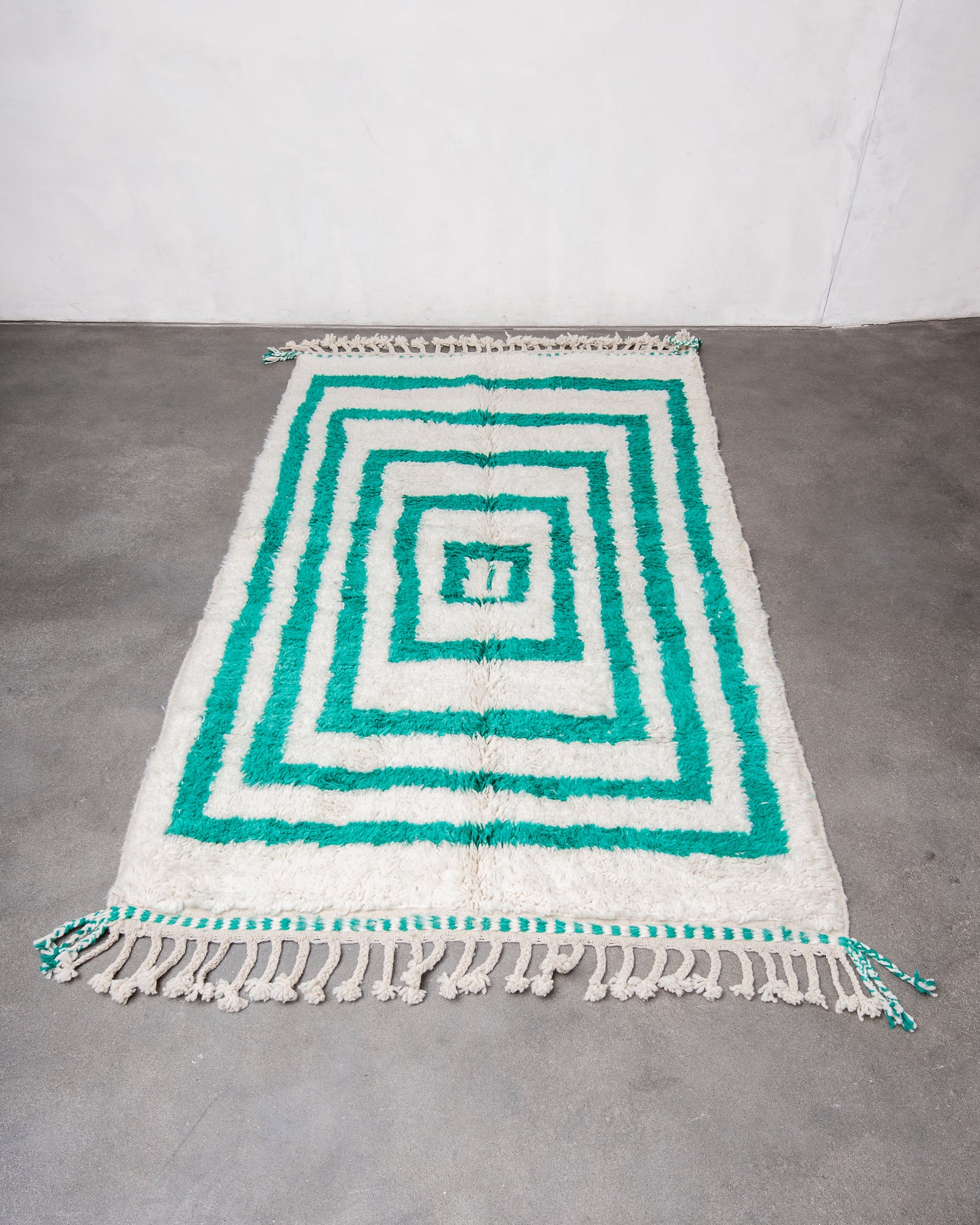 Modern, designer, handcrafted Berber rug from Morocco. Beniourain carpet with beautiful colours and patterns and fluffy wool texture.